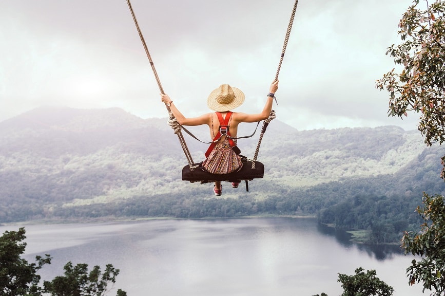 beautiful girl enjoying freedom on swing in bali 2021 09 03 10 20 38 utc